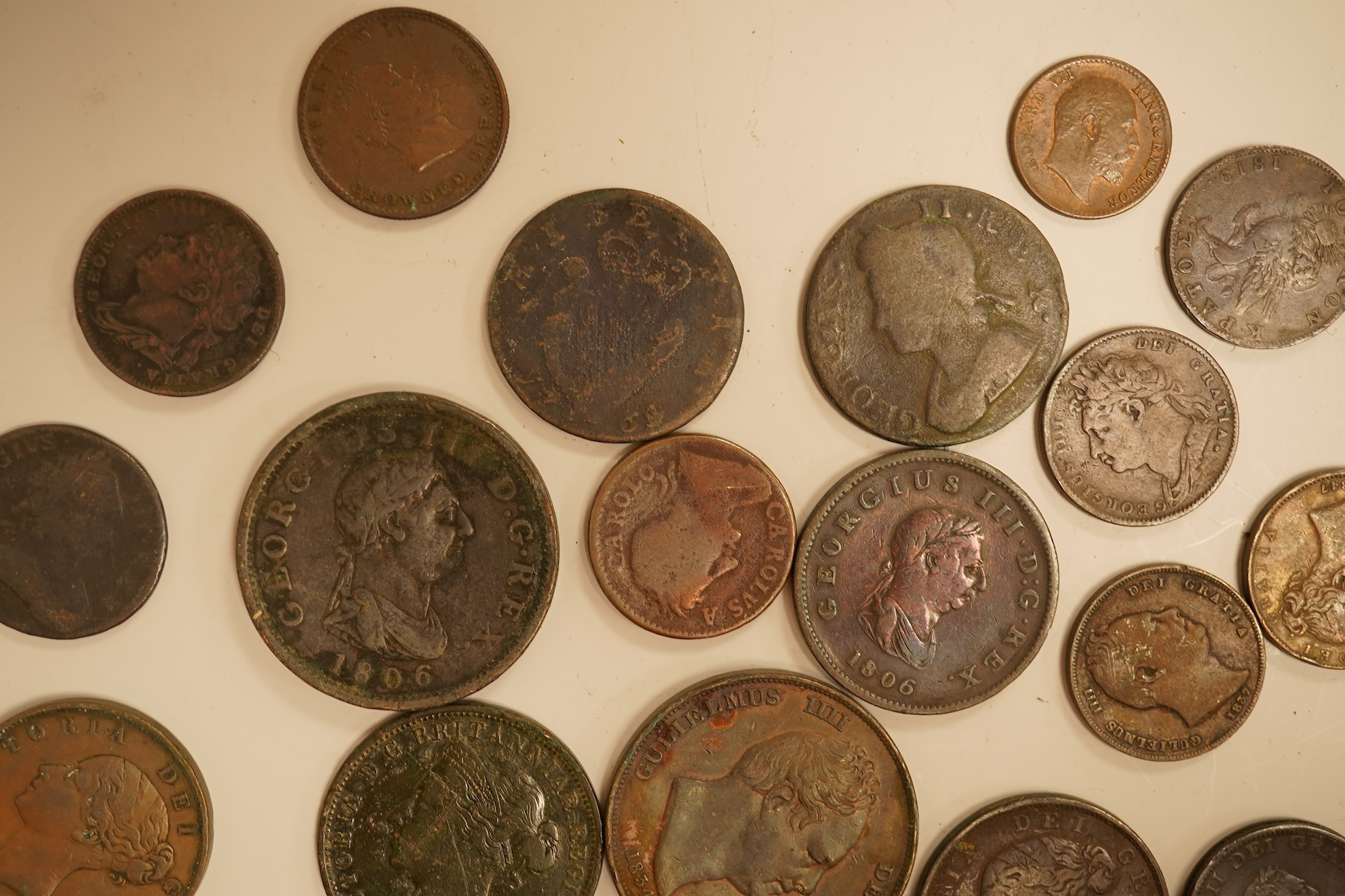 Twenty three copper coins including a William IV penny